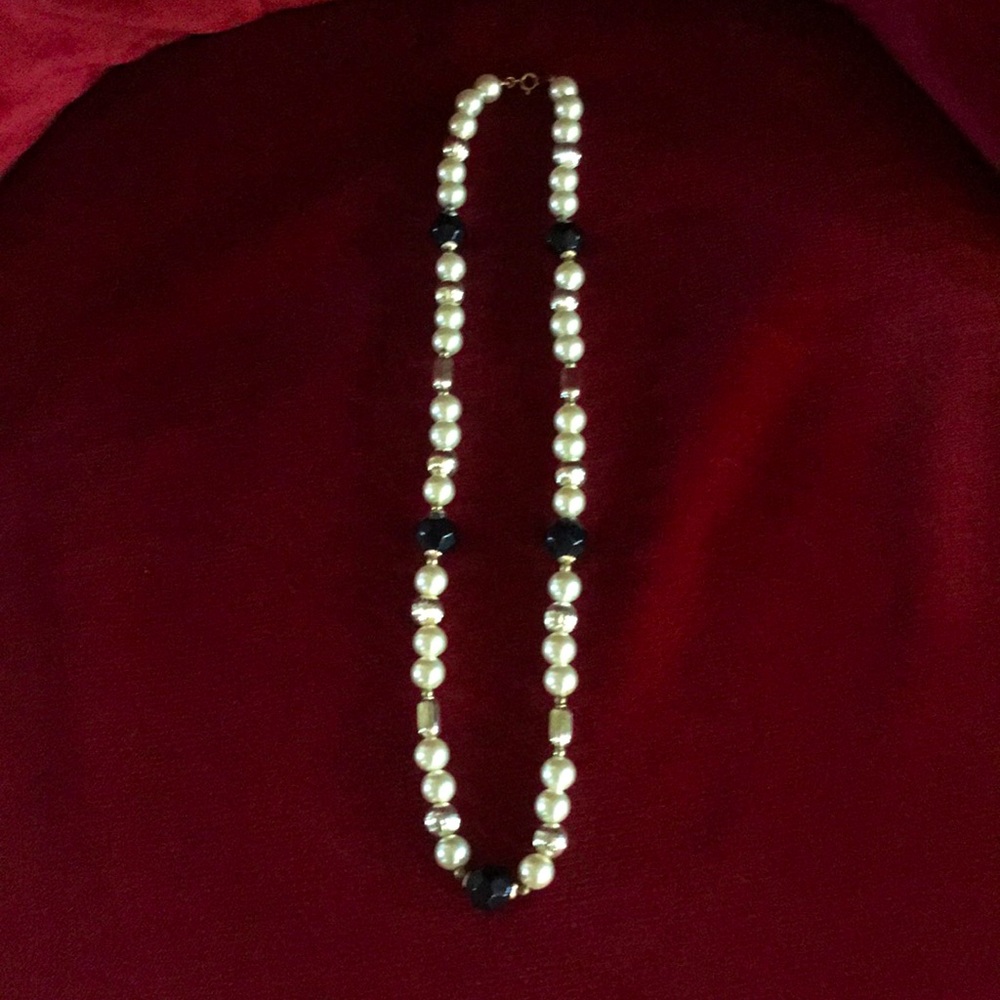 Women’s pearl necklace.
